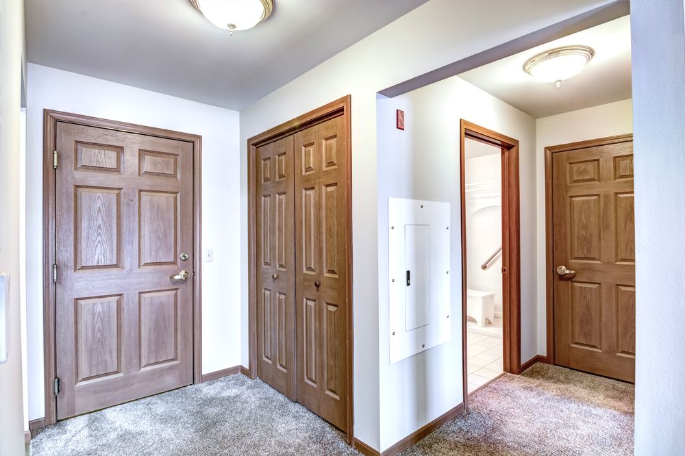 room facing closet and halway to bathroom